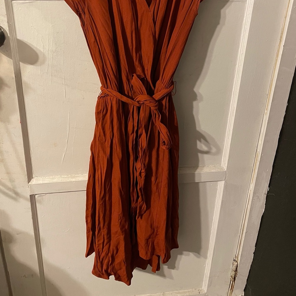 Anthropologie. Rust colored, v-neck dress.